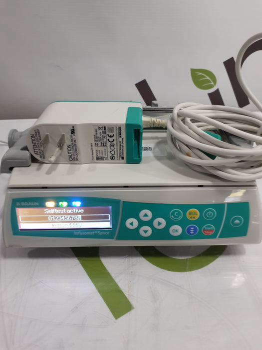 B. Braun Infusomat Space w/Pole Clamp & AC Adapter Infusion Pump