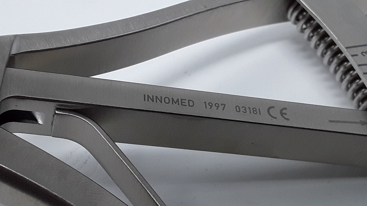 Innomed, Inc. 1997 Wide Block Pad Scott Femoral Tibial Tensor Spreader