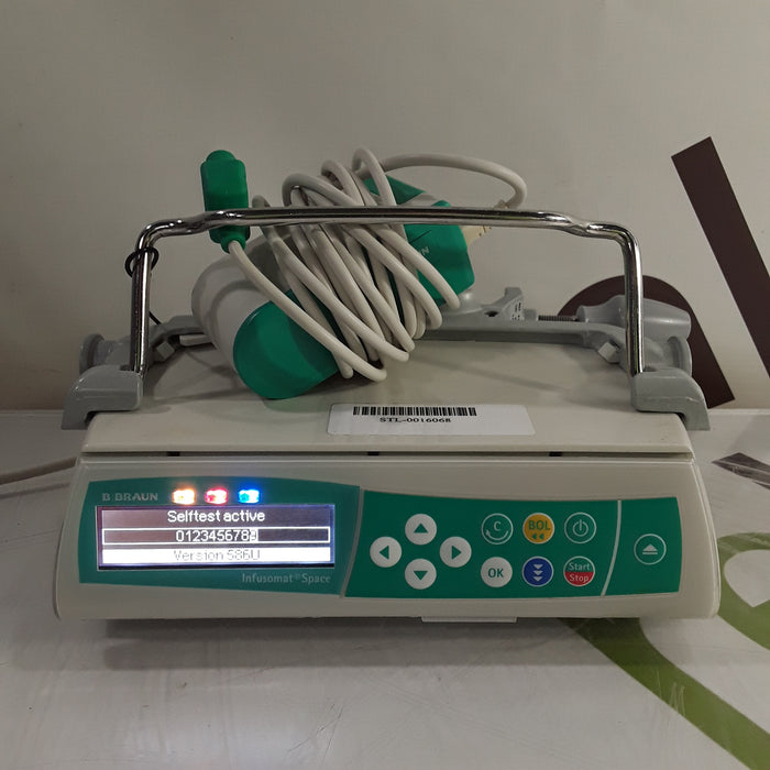 B. Braun Infusomat Space w/Pole Clamp & AC Adapter Infusion Pump