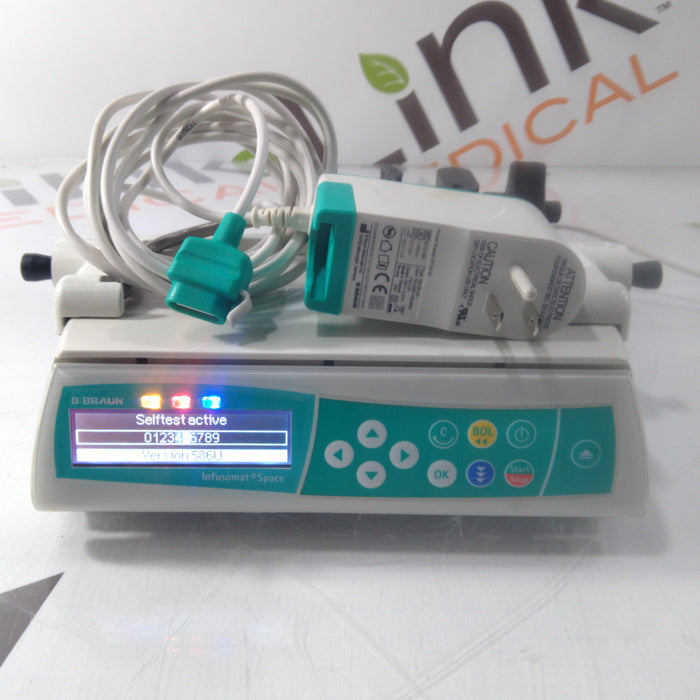 B. Braun Infusomat Space w/Pole Clamp & AC Adapter Infusion Pump