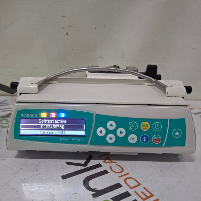 B. Braun Infusomat Space w/Pole Clamp & AC Adapter Infusion Pump