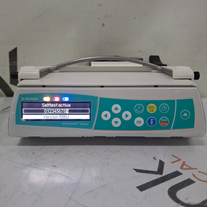 B. Braun Infusomat Space w/Pole Clamp & AC Adapter Infusion Pump