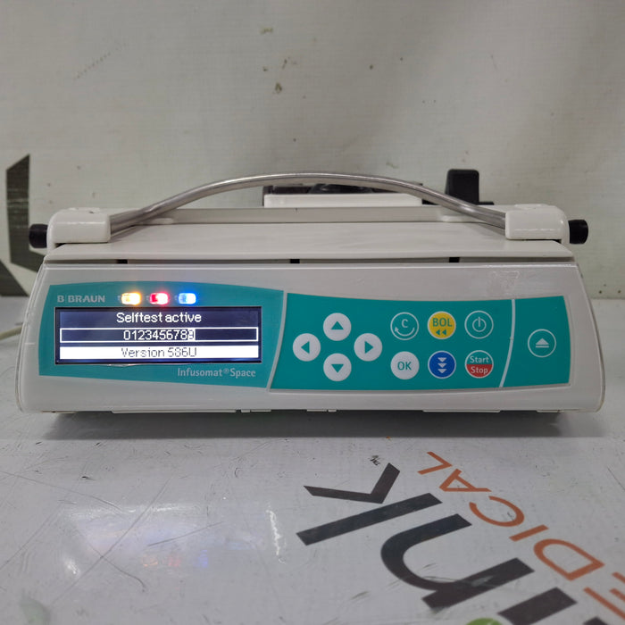 B. Braun Infusomat Space w/Pole Clamp & AC Adapter Infusion Pump