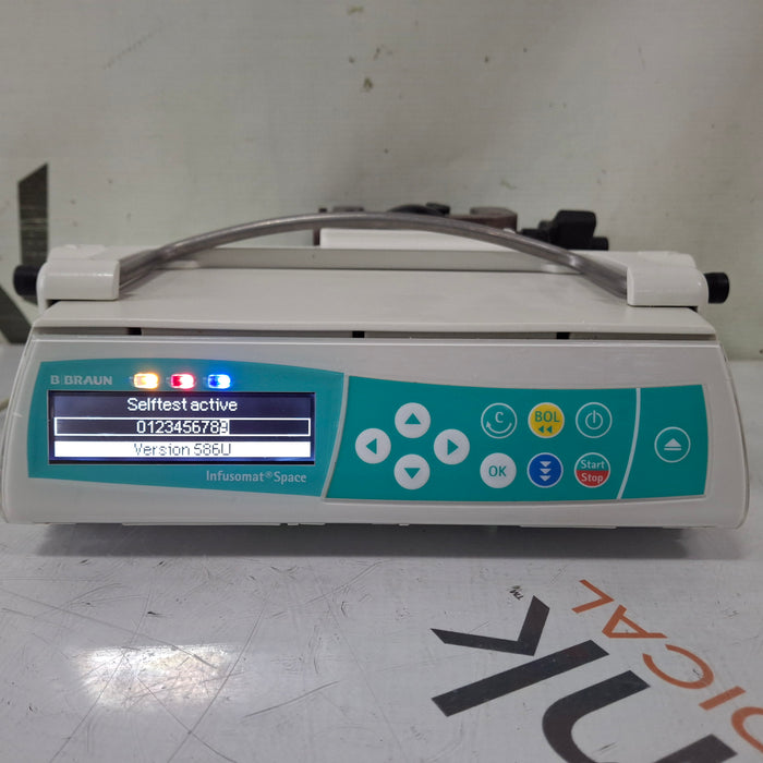 B. Braun B. Braun Infusomat Space w/Pole Clamp & AC Adapter Infusion Pump Infusion Pump reLink Medical