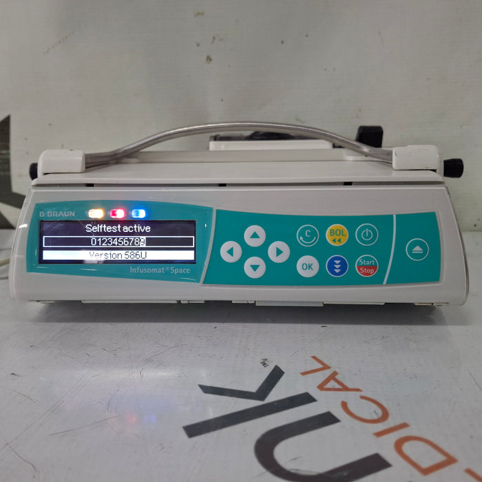 B. Braun Infusomat Space w/Pole Clamp & AC Adapter Infusion Pump