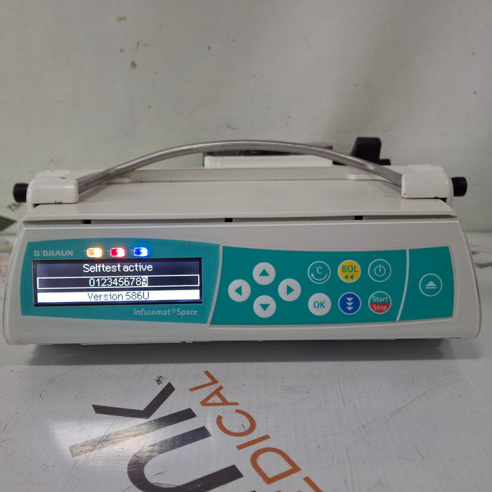 B. Braun Infusomat Space w/Pole Clamp & AC Adapter Infusion Pump