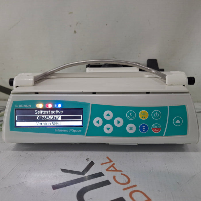 B. Braun Infusomat Space w/Pole Clamp & AC Adapter Infusion Pump