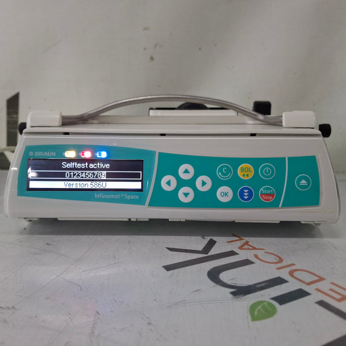 B. Braun B. Braun Infusomat Space w/Pole Clamp & AC Adapter Infusion Pump Infusion Pump reLink Medical