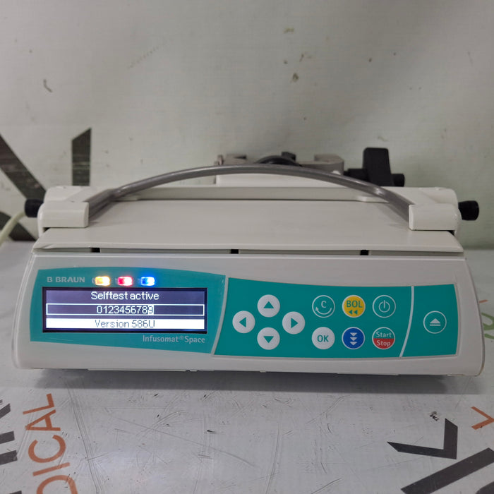B. Braun Infusomat Space w/Pole Clamp & AC Adapter Infusion Pump