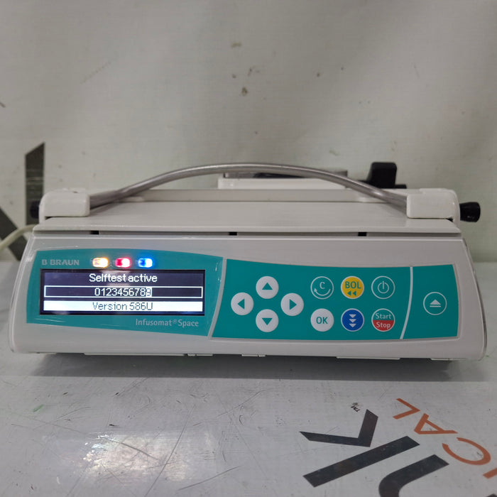 B. Braun Infusomat Space w/Pole Clamp & AC Adapter Infusion Pump