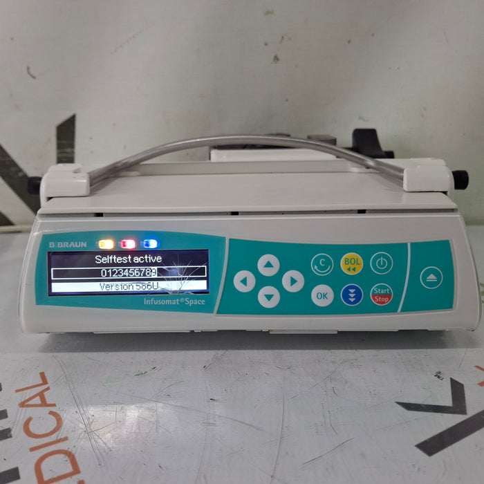 B. Braun Infusomat Space w/Pole Clamp & AC Adapter Infusion Pump