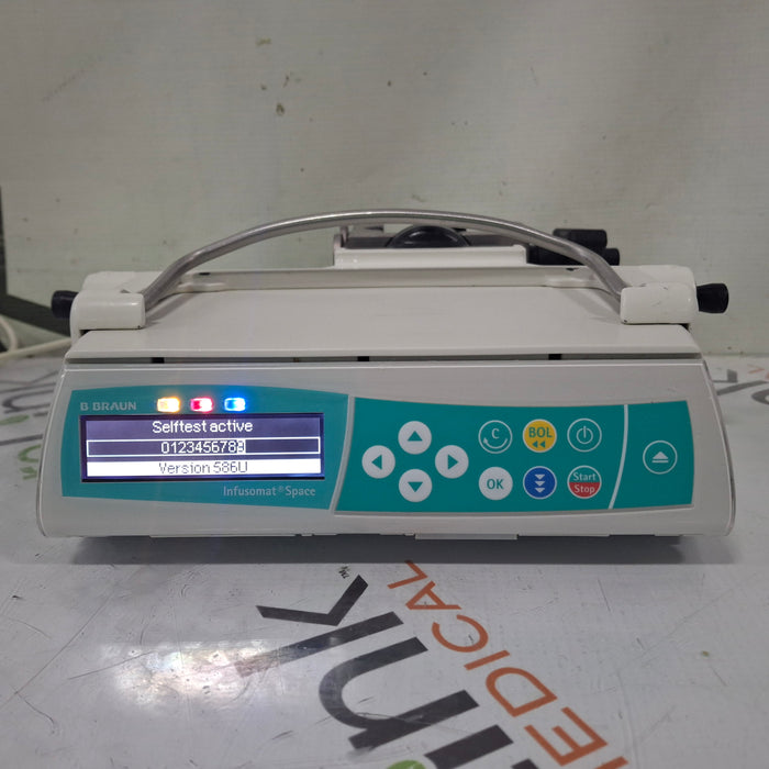 B. Braun Infusomat Space w/Pole Clamp & AC Adapter Infusion Pump