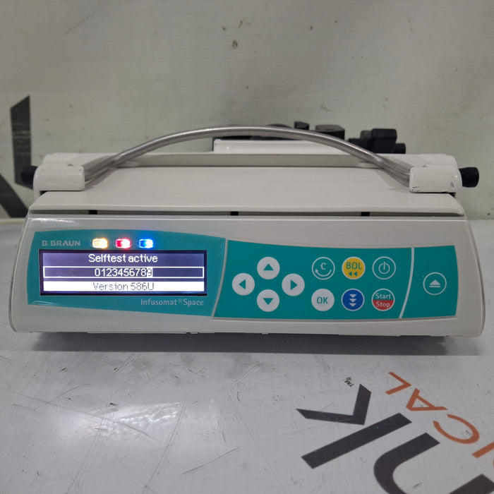 B. Braun Infusomat Space w/Pole Clamp & AC Adapter Infusion Pump
