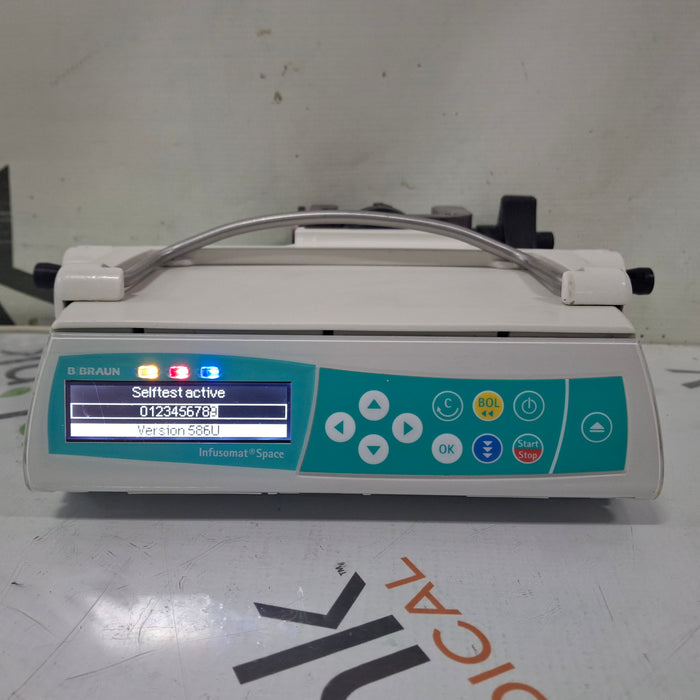B. Braun Infusomat Space w/Pole Clamp & AC Adapter Infusion Pump