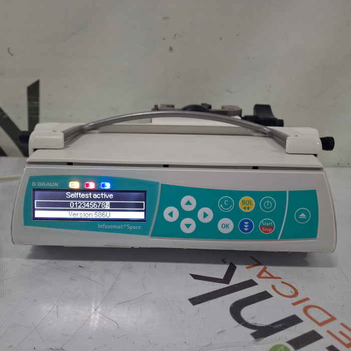 B. Braun Infusomat Space w/Pole Clamp & AC Adapter Infusion Pump
