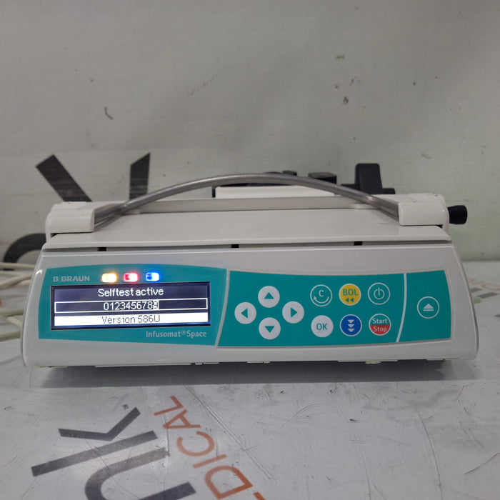 B. Braun B. Braun Infusomat Space w/Pole Clamp & AC Adapter Infusion Pump Infusion Pump reLink Medical