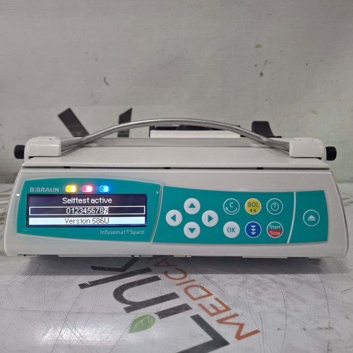 B. Braun Infusomat Space w/Pole Clamp & AC Adapter Infusion Pump