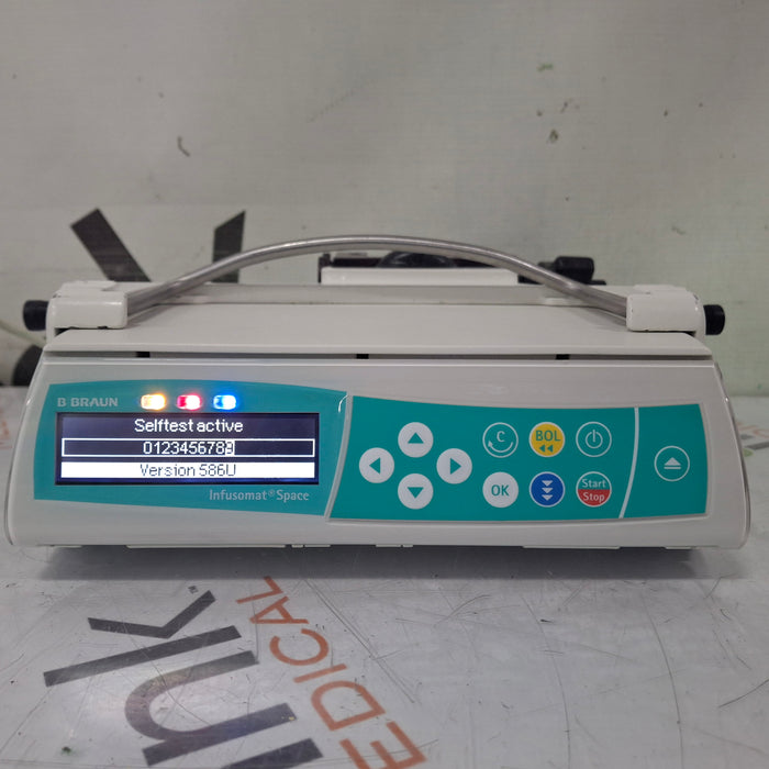 B. Braun Infusomat Space w/Pole Clamp & AC Adapter Infusion Pump