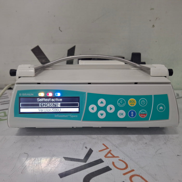 B. Braun Infusomat Space w/Pole Clamp & AC Adapter Infusion Pump