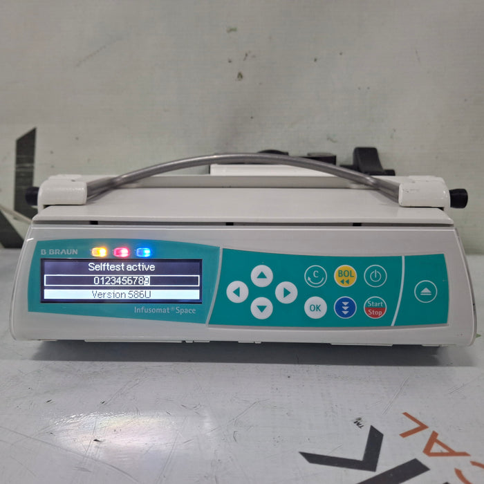 B. Braun Infusomat Space w/Pole Clamp & AC Adapter Infusion Pump