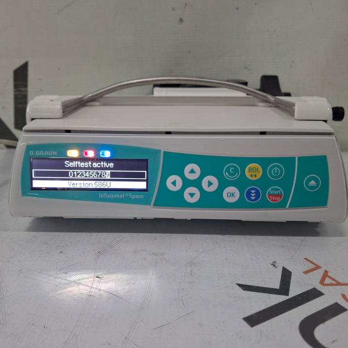 B. Braun B. Braun Infusomat Space w/Pole Clamp & AC Adapter Infusion Pump Infusion Pump reLink Medical