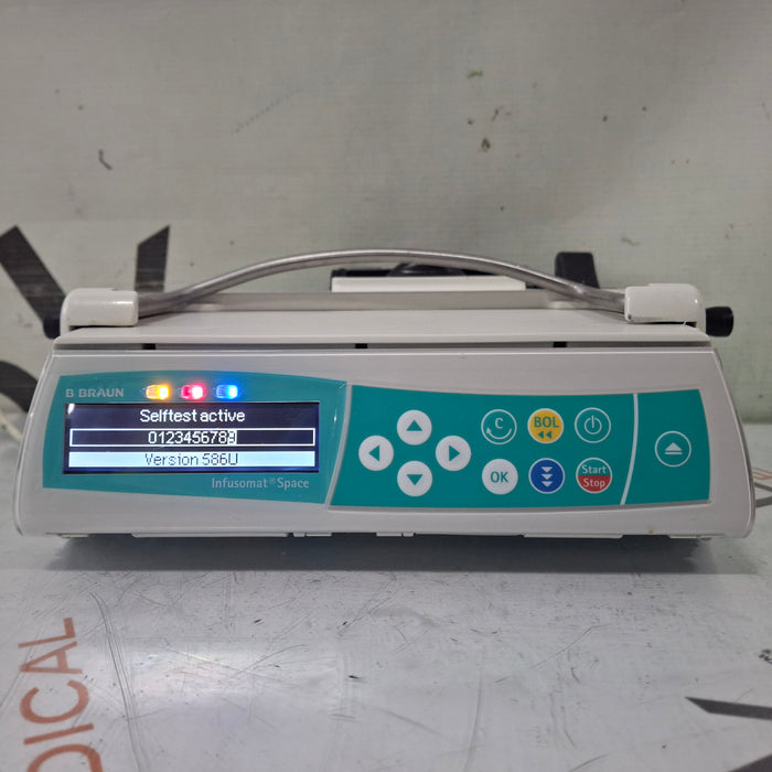 B. Braun Infusomat Space w/Pole Clamp & AC Adapter Infusion Pump