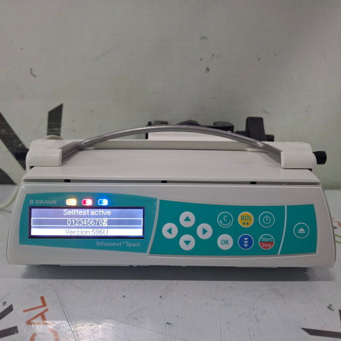 B. Braun Infusomat Space w/Pole Clamp & AC Adapter Infusion Pump