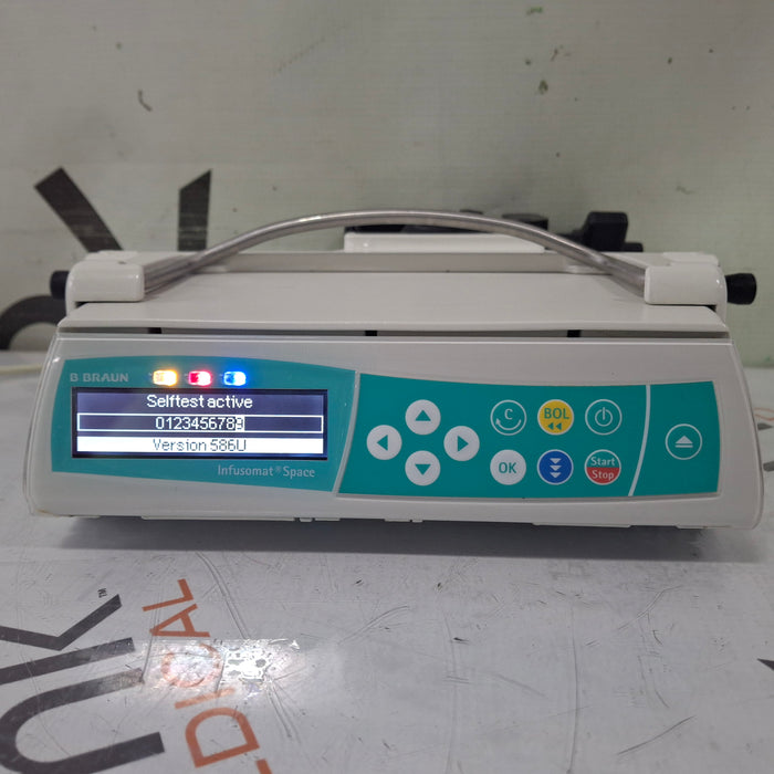 B. Braun Infusomat Space w/Pole Clamp & AC Adapter Infusion Pump