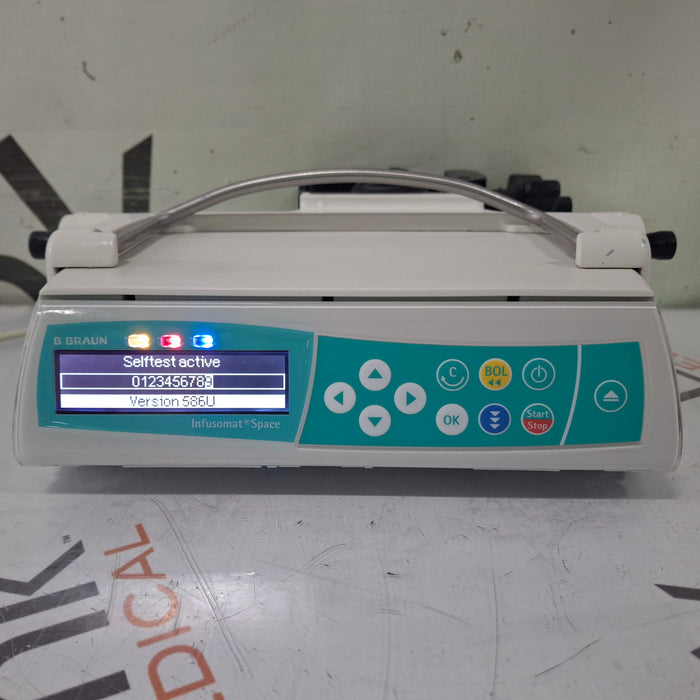 B. Braun Infusomat Space w/Pole Clamp & AC Adapter Infusion Pump