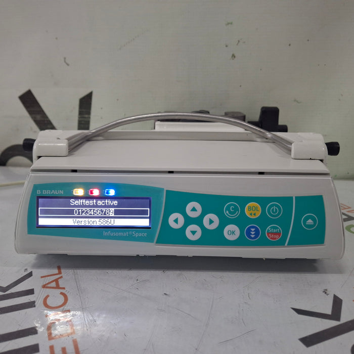B. Braun Infusomat Space w/Pole Clamp & AC Adapter Infusion Pump