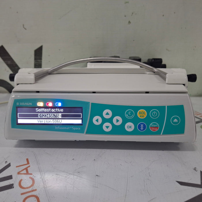 B. Braun Infusomat Space w/Pole Clamp & AC Adapter Infusion Pump