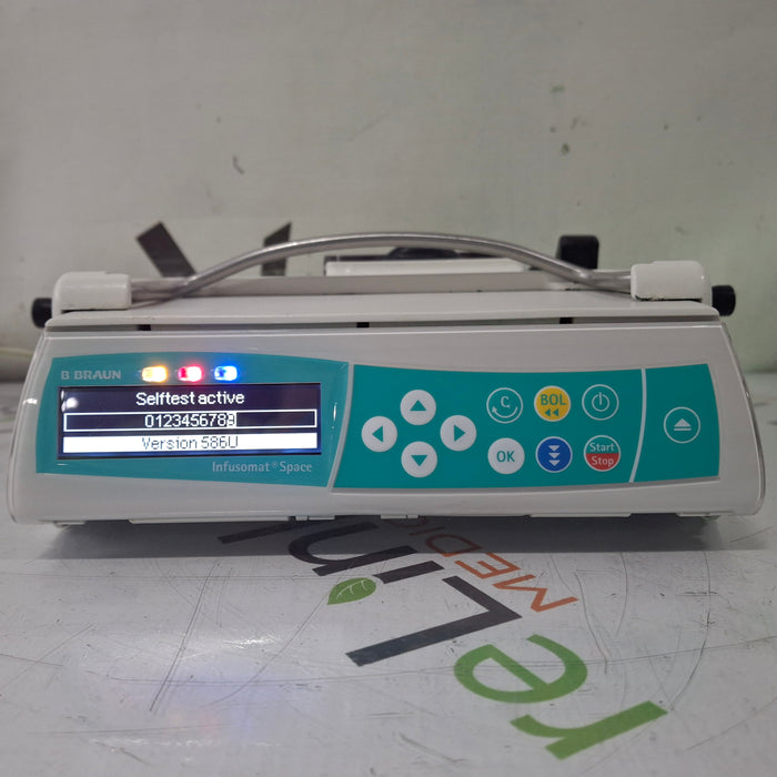 B. Braun Infusomat Space w/Pole Clamp & AC Adapter Infusion Pump