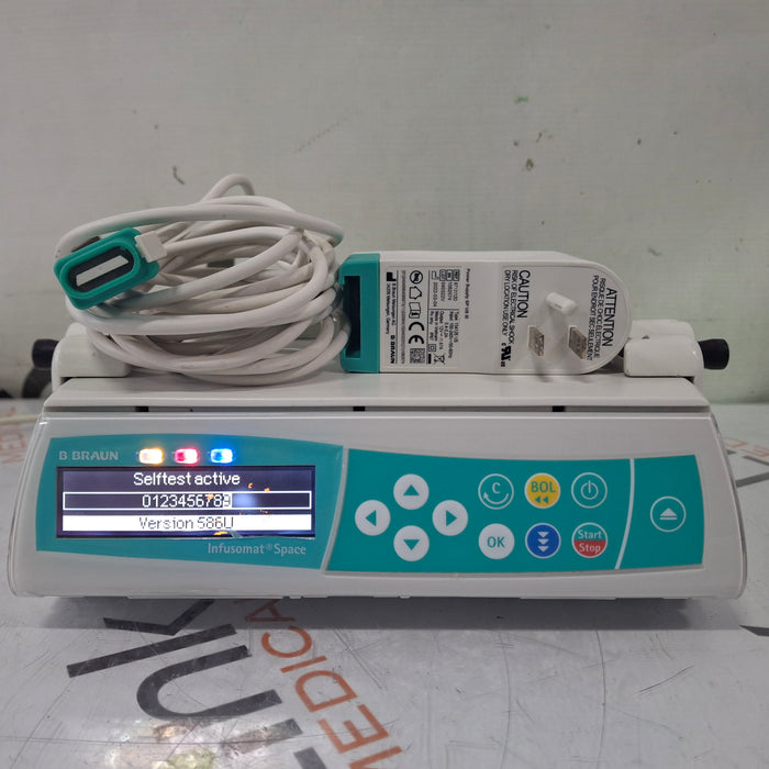 B. Braun Infusomat Space w/Pole Clamp & AC Adapter Infusion Pump