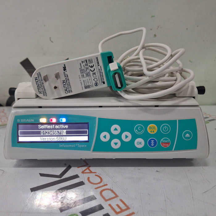 B. Braun Infusomat Space w/Pole Clamp & AC Adapter Infusion Pump