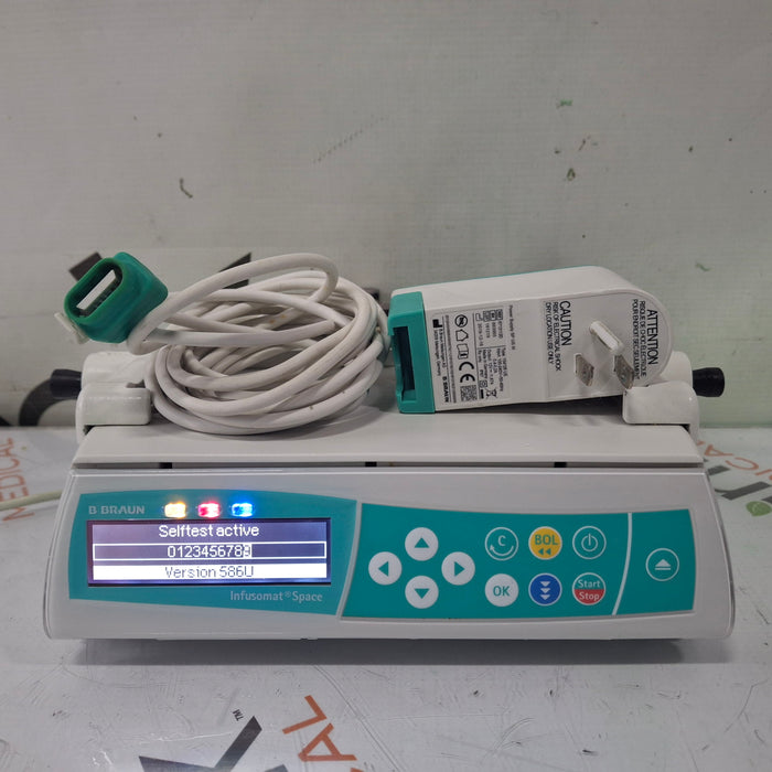 B. Braun Infusomat Space w/Pole Clamp & AC Adapter Infusion Pump