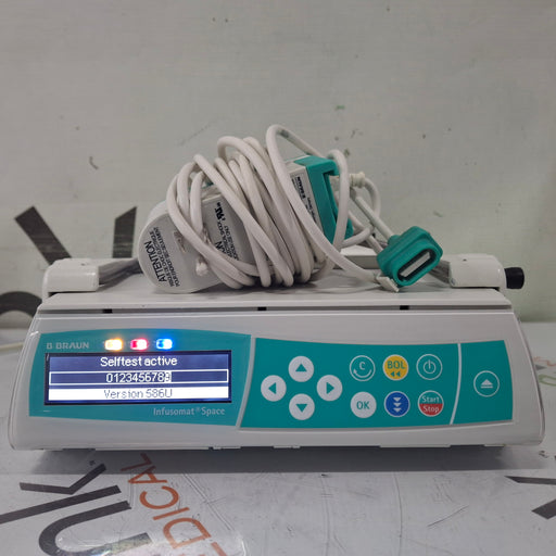 B. Braun B. Braun Infusomat Space w/Pole Clamp & AC Adapter Infusion Pump Infusion Pump reLink Medical