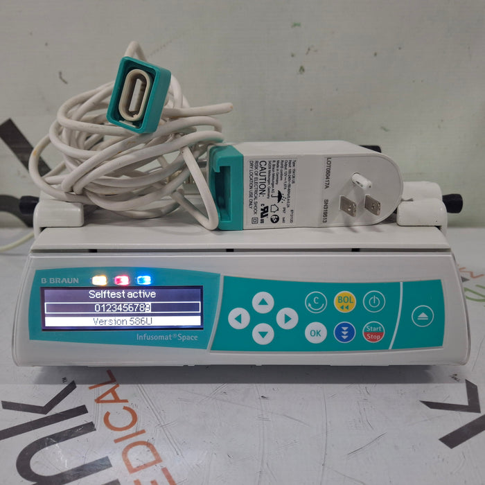 B. Braun Infusomat Space w/Pole Clamp & AC Adapter Infusion Pump