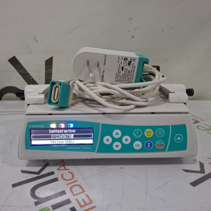 B. Braun Infusomat Space w/Pole Clamp & AC Adapter Infusion Pump