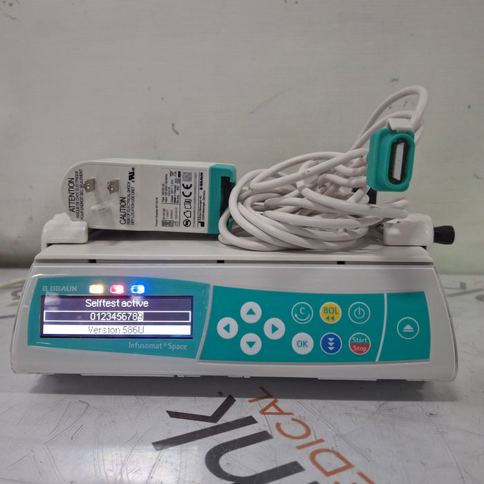 B. Braun Infusomat Space w/Pole Clamp & AC Adapter Infusion Pump