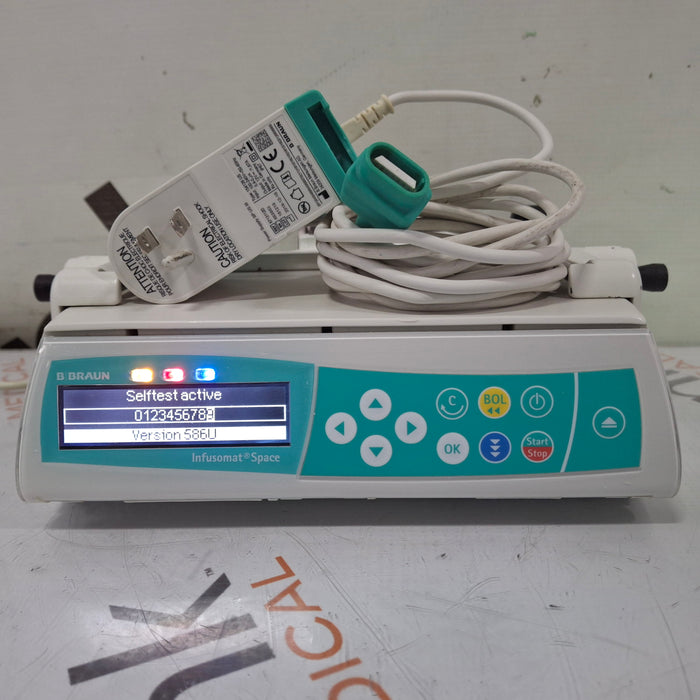 B. Braun Infusomat Space w/Pole Clamp & AC Adapter Infusion Pump