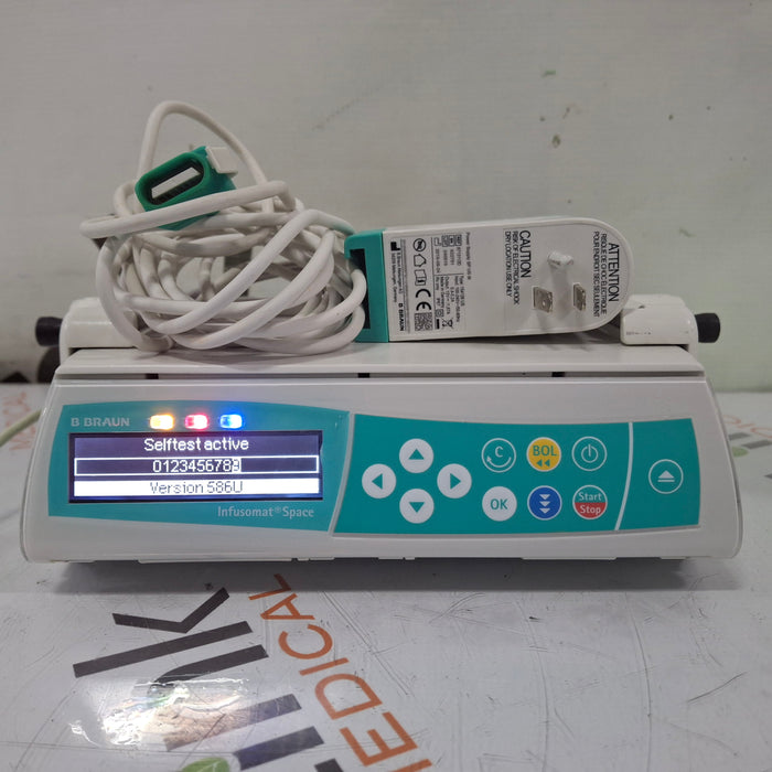 B. Braun Infusomat Space w/Pole Clamp & AC Adapter Infusion Pump