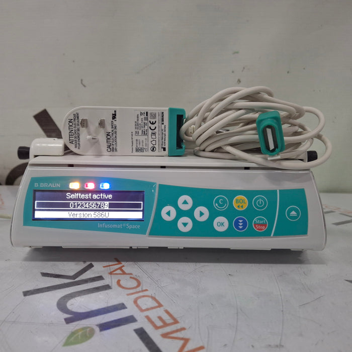 B. Braun Infusomat Space w/Pole Clamp & AC Adapter Infusion Pump