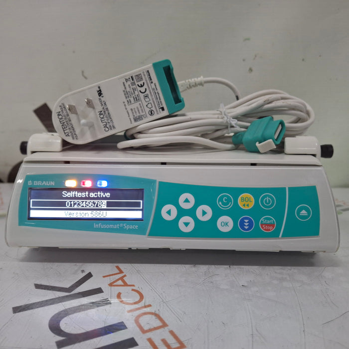 B. Braun Infusomat Space w/Pole Clamp & AC Adapter Infusion Pump