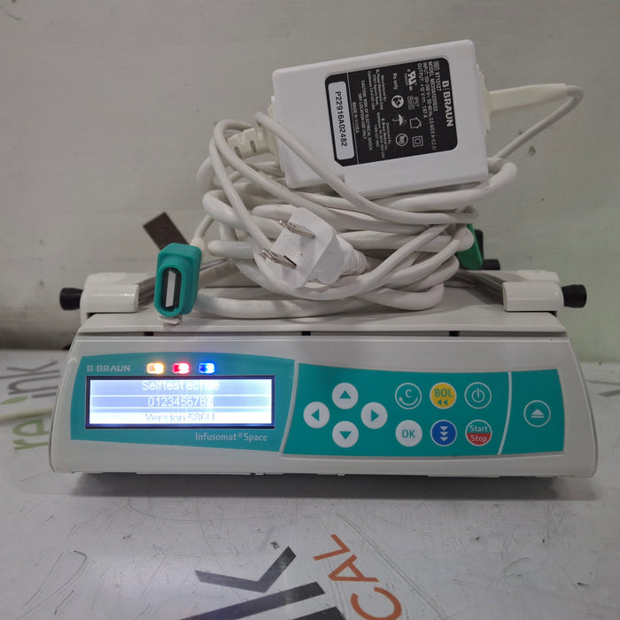 B. Braun Infusomat Space w/Pole Clamp & AC Adapter Infusion Pump