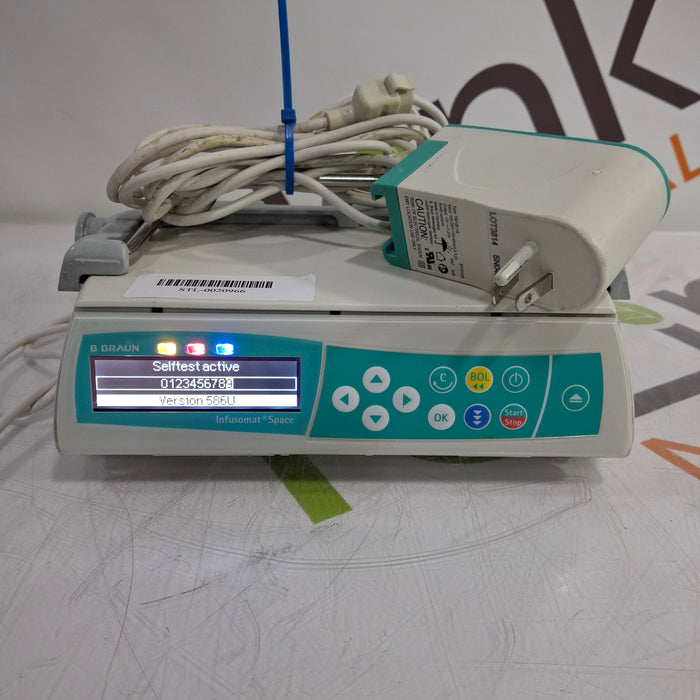 B. Braun Infusomat Space w/Pole Clamp & AC Adapter Infusion Pump