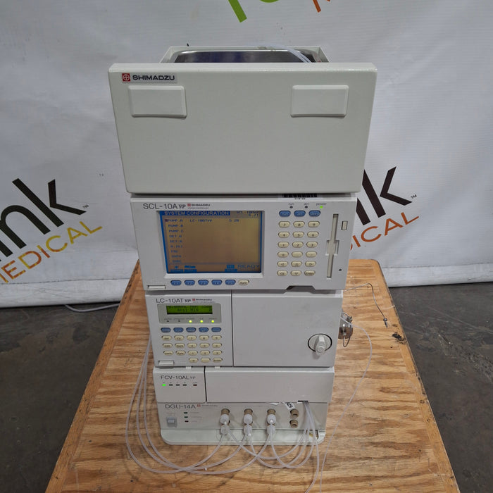 Shimadzu SCL-10AVP LC-10ATVP FCV-10ALVP DGU-14A HPLC System