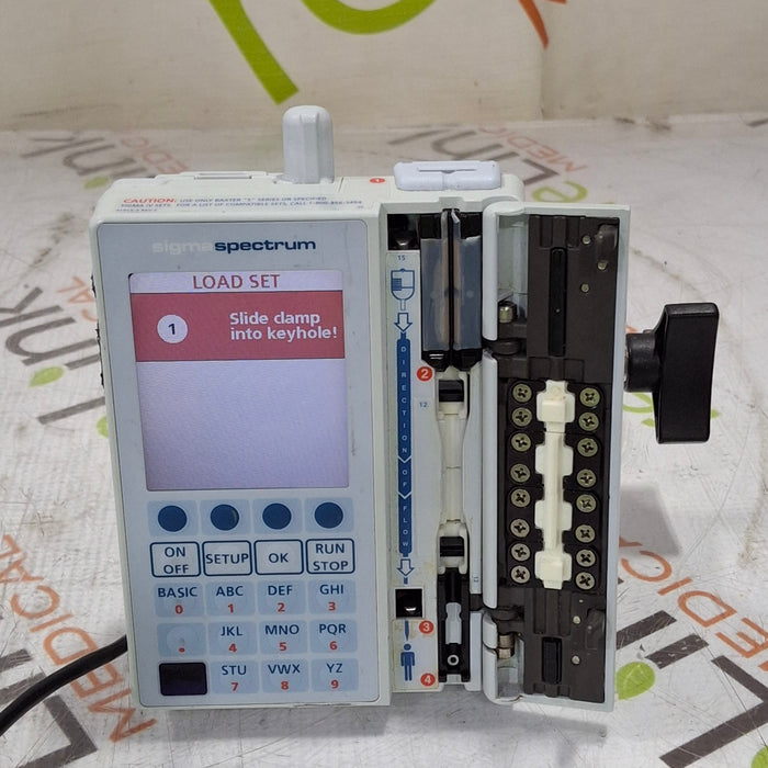 Baxter Baxter Sigma Spectrum 6.05.13 with B/G Battery Infusion Pump Infusion Pump reLink Medical