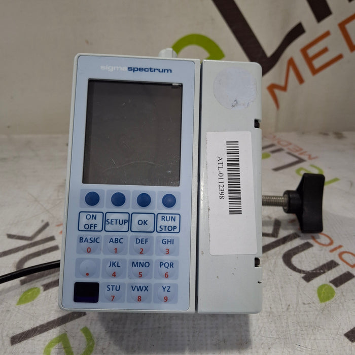 Baxter Baxter Sigma Spectrum 6.05.14 with B/G Battery Infusion Pump Infusion Pump reLink Medical