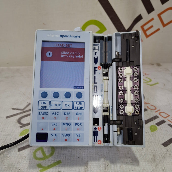 Baxter Baxter Sigma Spectrum 6.05.14 with B/G Battery Infusion Pump Infusion Pump reLink Medical