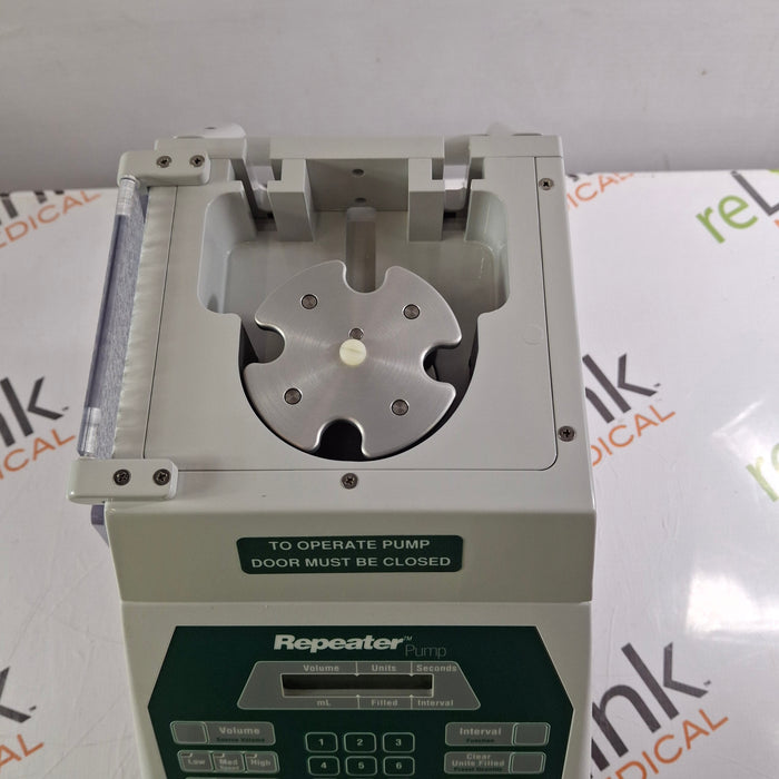 Baxa Corporation Repeater Pump Peristaltic Fluid Transfer